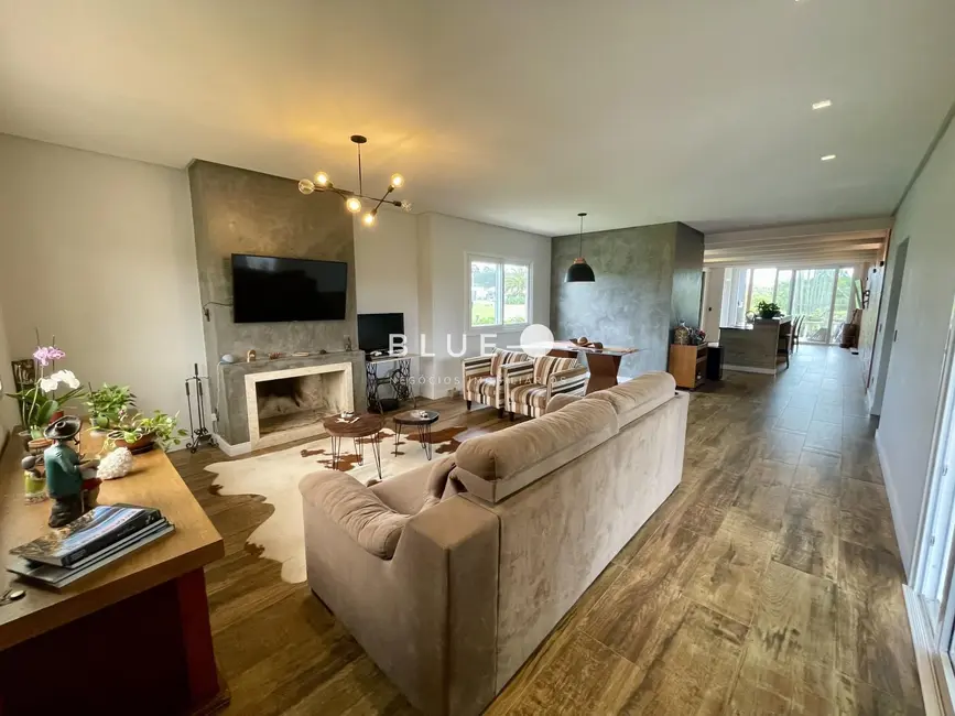 Casa de Condomínio com 4 quartos à venda, 214m2 em Torres - RS - imagem 2 Foto 2 de Casa de Condomínio com 4 quartos à venda, 214m2 em Torres - RS