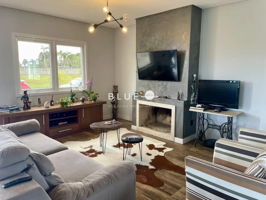 Casa de Condomínio com 4 quartos à venda, 214m2 em Torres - RS - imagem 1 Foto 1 de Casa de Condomínio com 4 quartos à venda, 214m2 em Torres - RS