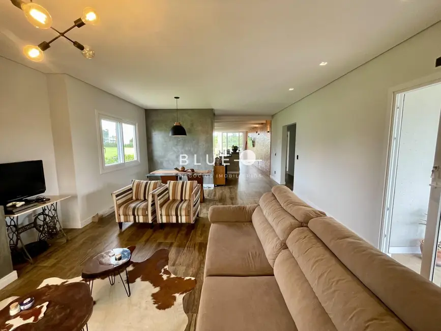 Casa de Condomínio com 4 quartos à venda, 214m2 em Torres - RS - imagem 3 Foto 3 de Casa de Condomínio com 4 quartos à venda, 214m2 em Torres - RS