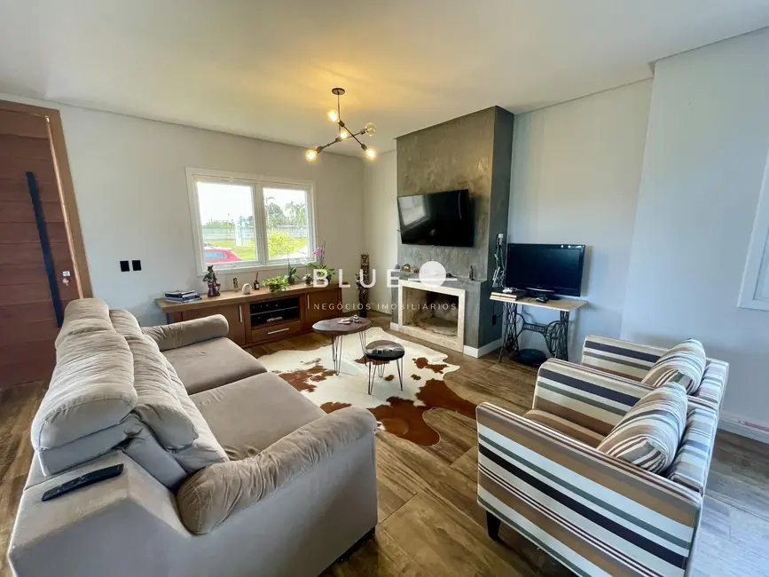 Casa de Condomínio com 4 quartos à venda, 214m2 em Torres - RS - imagem 5 Foto 5 de Casa de Condomínio com 4 quartos à venda, 214m2 em Torres - RS