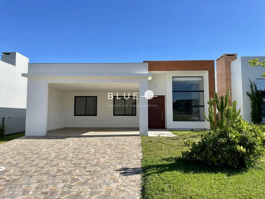 Foto 1 de Casa de Condomínio com 3 quartos à venda, 260m2 em Torres - RS