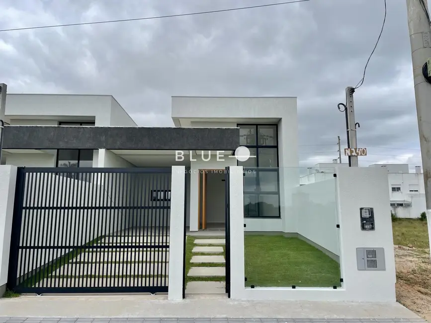 Foto 1 de Casa com 3 quartos à venda, 110m2 em Torres - RS
