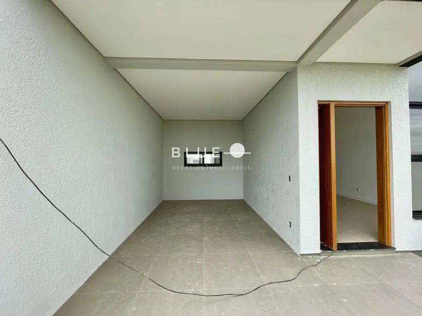 Foto 3 de Casa com 3 quartos à venda, 110m2 em Torres - RS