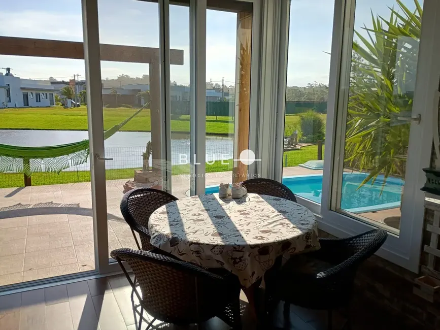 Foto 7 de Casa de Condomínio com 3 quartos à venda, 260m2 em Torres - RS