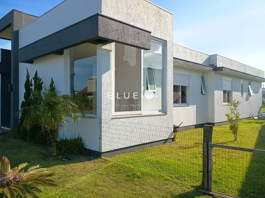 Foto 2 de Casa de Condomínio com 3 quartos à venda, 260m2 em Torres - RS