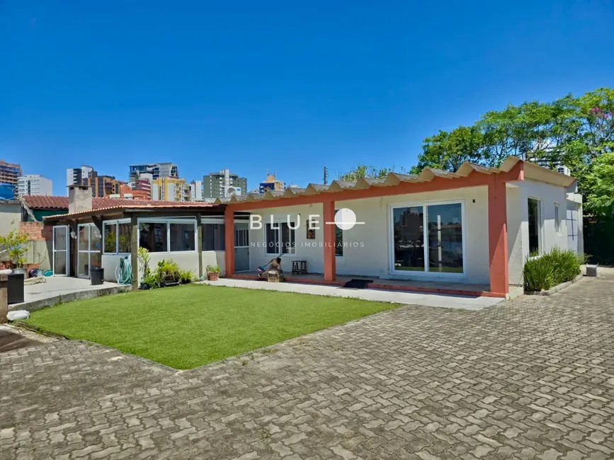 Foto 1 de Casa com 4 quartos à venda, 150m2 em Torres - RS