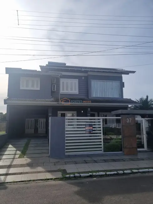 Foto 1 de Sobrado com 3 quartos à venda, 81m2 em Centro, Osorio - RS