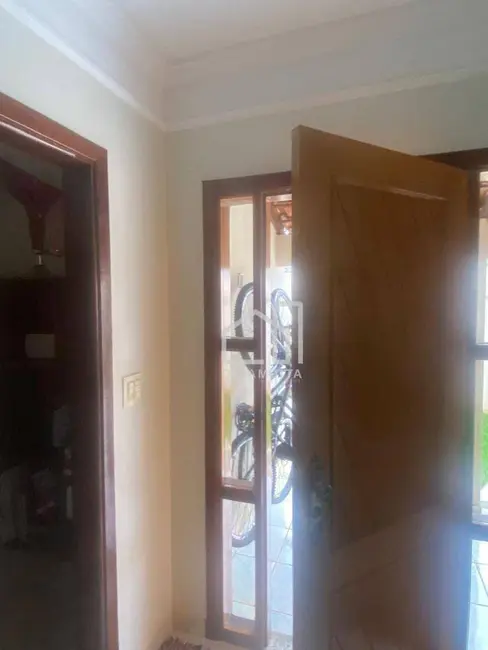 Foto 5 de Casa com 4 quartos à venda, 360m2 em Segismundo Pereira, Uberlandia - MG