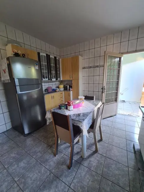 Foto 5 de Casa com 3 quartos à venda, 360m2 em Segismundo Pereira, Uberlandia - MG