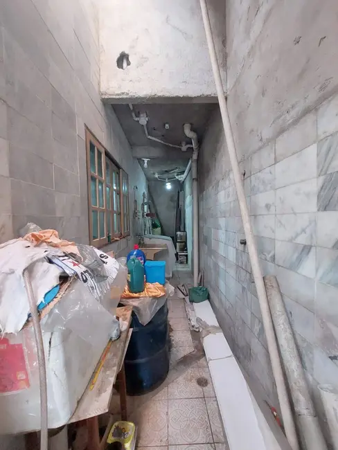 Foto 4 de Sobrado com 3 quartos à venda, 235m2 em Praia Grande - SP