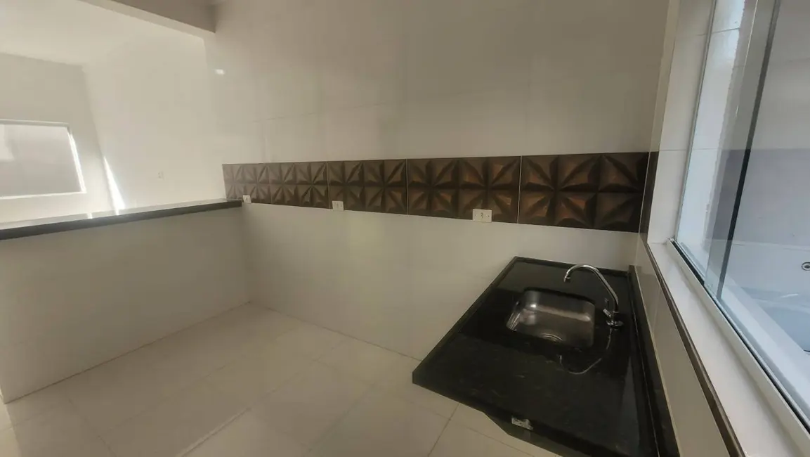 Foto 4 de Casa de Condomínio com 2 quartos para alugar, 48m2 em Maracanã, Praia Grande - SP