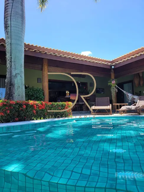 Foto 1 de Casa de Condomínio com 3 quartos à venda em Porto Seguro - BA