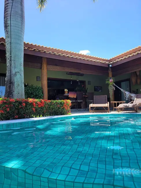 Foto 1 de Casa de Condomínio com 3 quartos à venda em Porto Seguro - BA