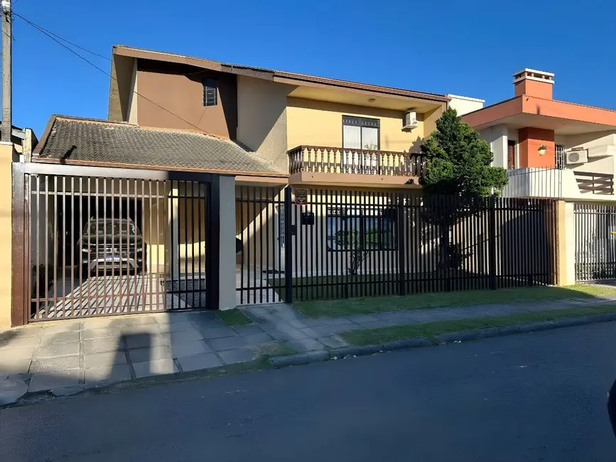 Foto 1 de Casa com 4 quartos à venda, 309m2 em Jardim das Américas, Curitiba - PR