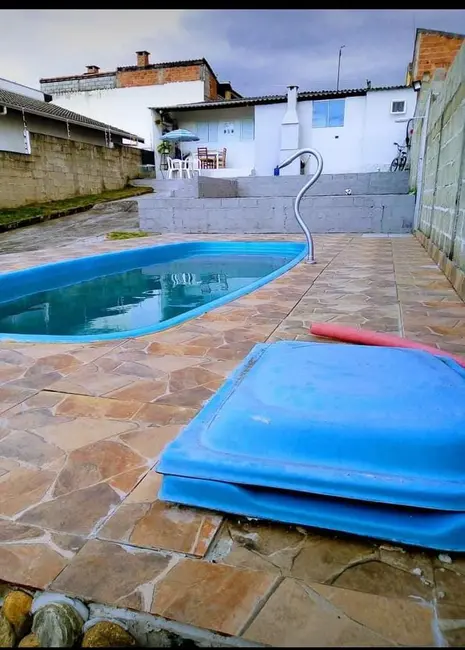 Foto 1 de Casa com 2 quartos à venda, 70m2 em Residencial e Comercial Cidade Jardim, Pindamonhangaba - SP