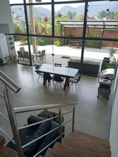 Foto 1 de Casa de Condomínio com 4 quartos à venda, 250m2 em Ubatuba - SP