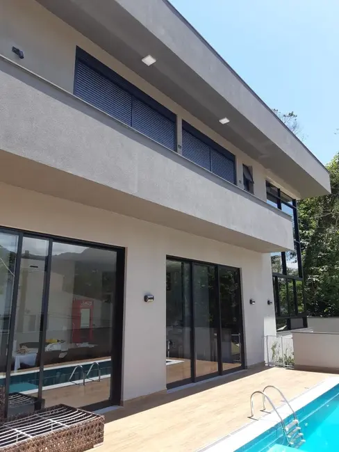 Casa de Condomínio com 4 quartos à venda, 230m2 em Ubatuba - SP - imagem 6 Foto 6 de Casa de Condomínio com 4 quartos à venda, 230m2 em Ubatuba - SP
