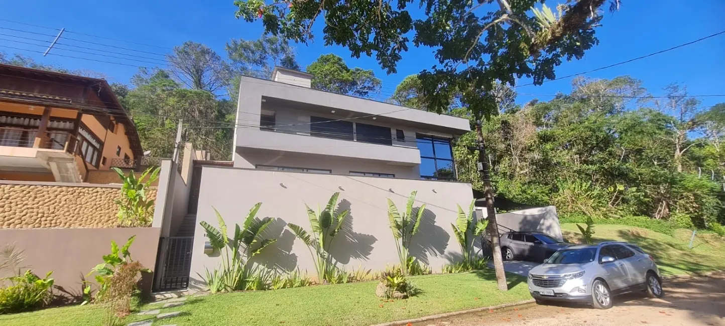 Casa de Condomínio com 4 quartos à venda, 230m2 em Ubatuba - SP - imagem 1 Foto 1 de Casa de Condomínio com 4 quartos à venda, 230m2 em Ubatuba - SP