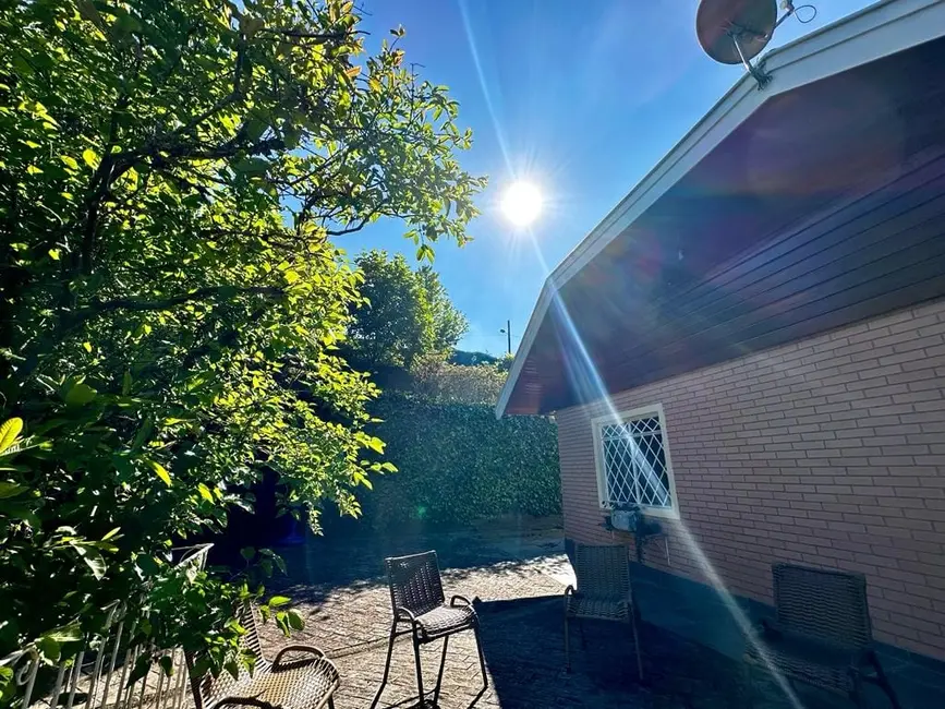 Foto 1 de Casa de Condomínio com 4 quartos à venda, 170m2 em Campos Do Jordao - SP