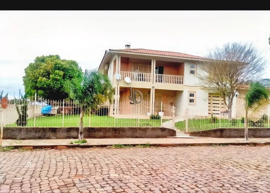 Foto 2 de Sobrado com 3 quartos à venda em Centro, Tapera - RS