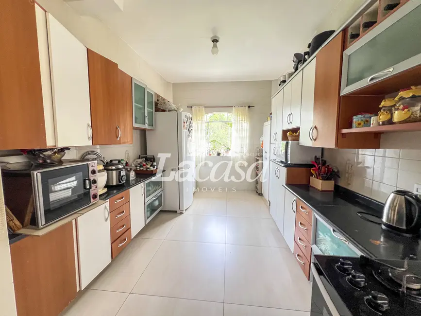 Foto 9 de Casa com 4 quartos à venda, 305m2 em Dos Estados, Guarapuava - PR