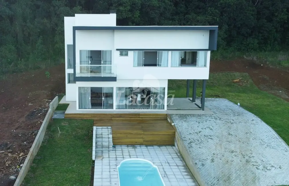 Foto 3 de Sobrado com 3 quartos à venda, 206m2 em Mangueirinha - PR