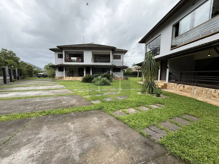 Foto 2 de Casa com 3 quartos à venda, 111m2 em Cidade Jardim, Caraguatatuba - SP