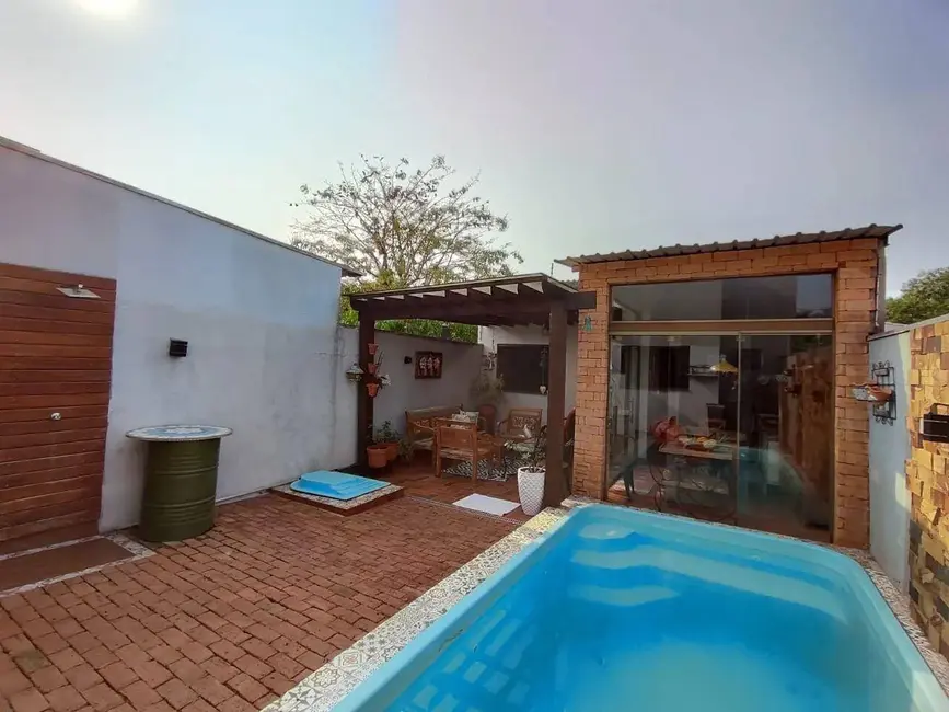 Foto 1 de Casa à venda em Jardim Rasslem, Dourados - MS