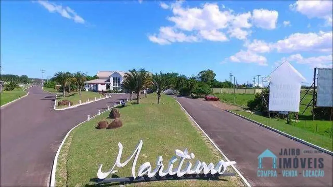 Foto 1 de Terreno / Lote à venda, 555m2 em Tramandai - RS