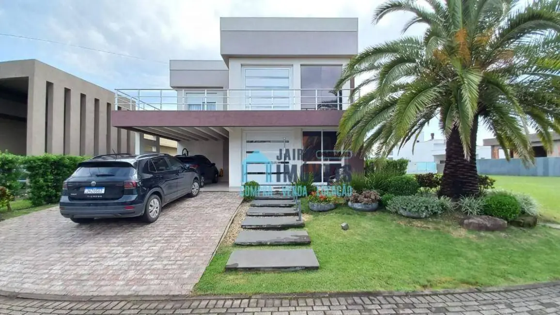 Foto 1 de Sobrado com 4 quartos à venda, 381m2 em Tramandai - RS