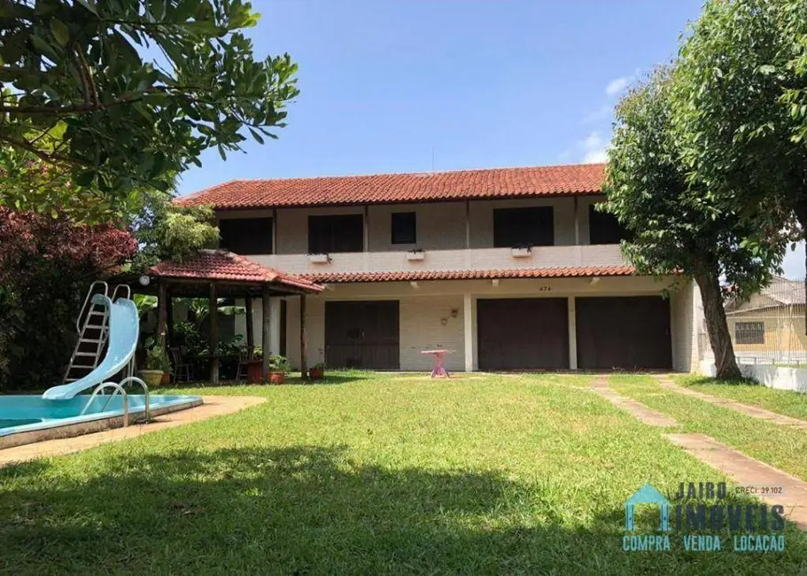 Casa com 4 quartos à venda, 450m2 em Centro, Tramandai - RS - imagem 1 Foto 1 de Casa com 4 quartos à venda, 450m2 em Centro, Tramandai - RS