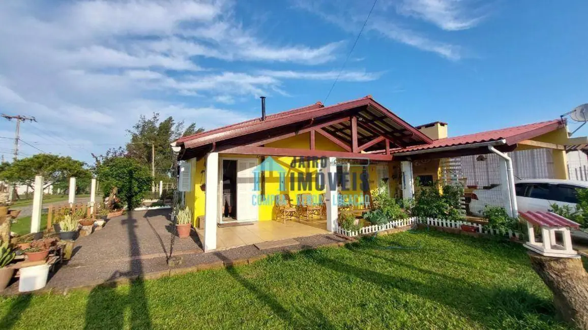 Foto 1 de Casa com 3 quartos à venda em Tramandai - RS