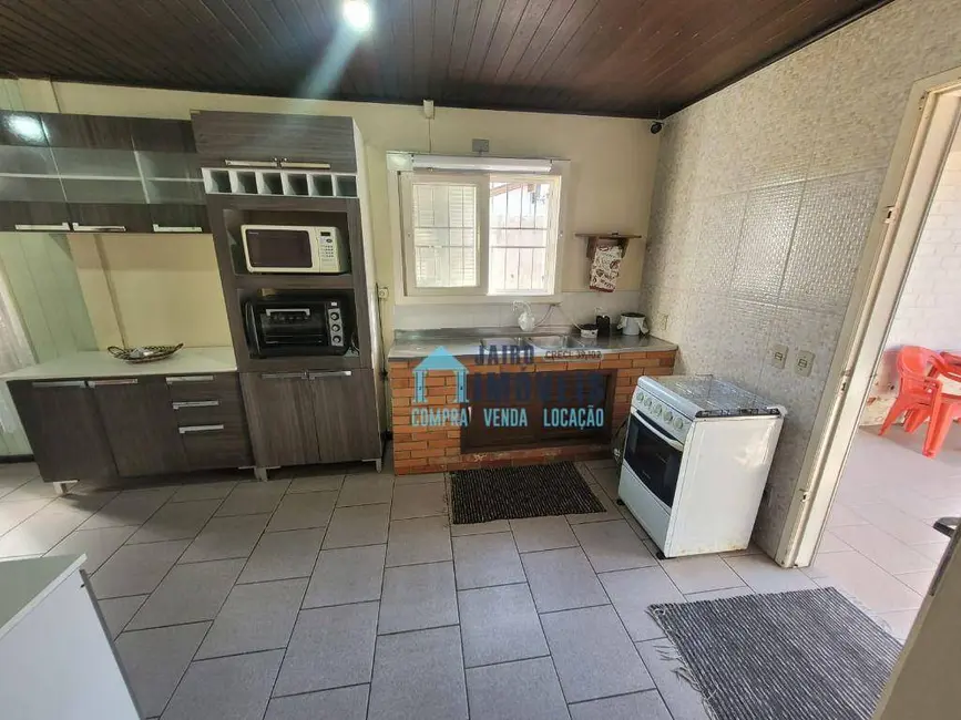 Foto 11 de Casa com 3 quartos à venda em Centro, Tramandai - RS