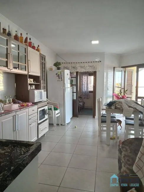 Casa com 2 quartos à venda, 129m2 em Centro, Tramandai - RS - imagem 5 Foto 5 de Casa com 2 quartos à venda, 129m2 em Centro, Tramandai - RS