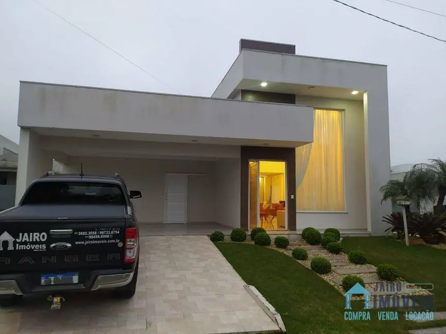Casa de Condomínio com 3 quartos à venda, 215m2 em Tramandai - RS - imagem 1 Foto 1 de Casa de Condomínio com 3 quartos à venda, 215m2 em Tramandai - RS