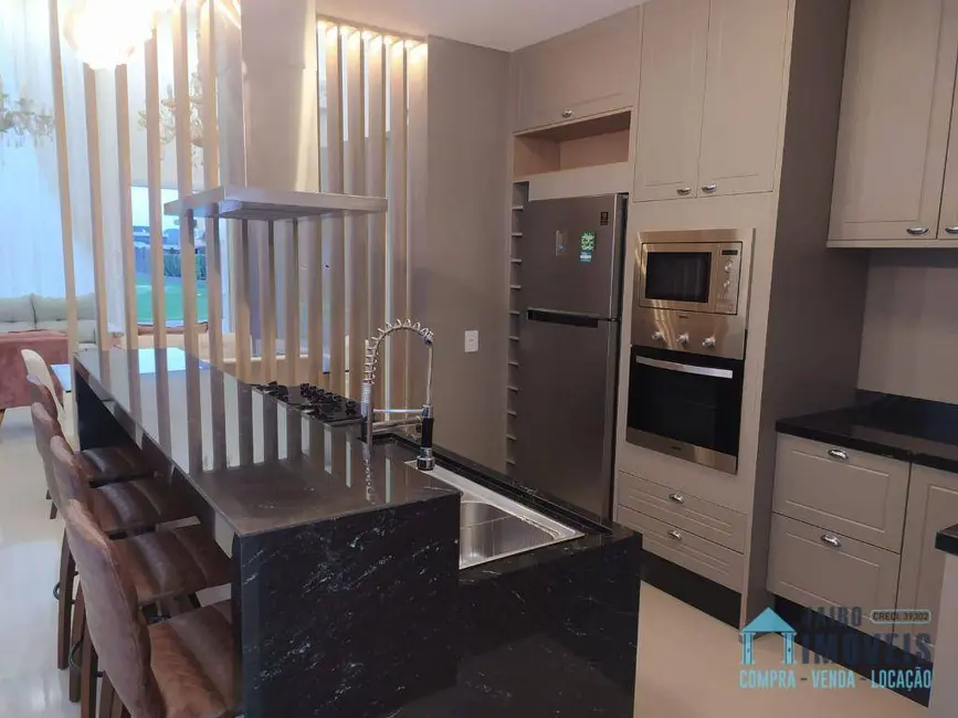 Casa de Condomínio com 3 quartos à venda, 215m2 em Tramandai - RS - imagem 6 Foto 6 de Casa de Condomínio com 3 quartos à venda, 215m2 em Tramandai - RS