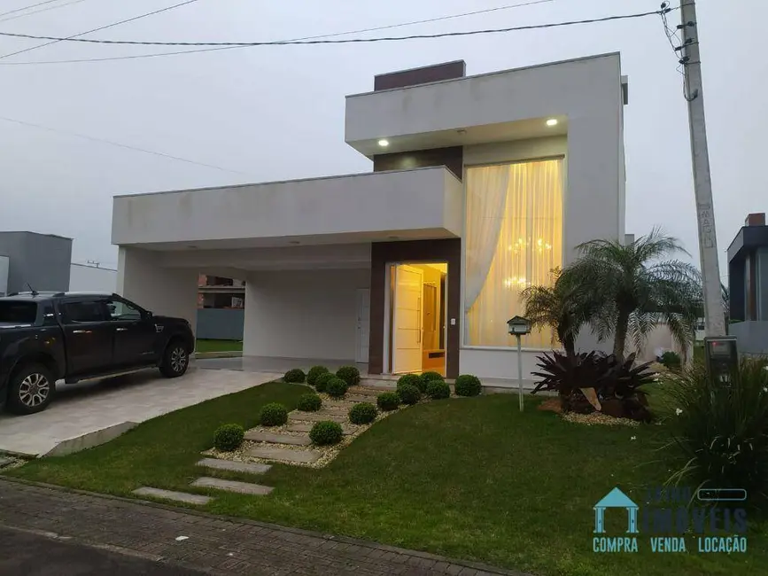 Casa de Condomínio com 3 quartos à venda, 215m2 em Tramandai - RS - imagem 2 Foto 2 de Casa de Condomínio com 3 quartos à venda, 215m2 em Tramandai - RS