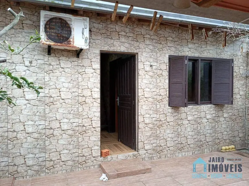 Foto 15 de Casa com 2 quartos à venda, 196m2 em Tramandai - RS