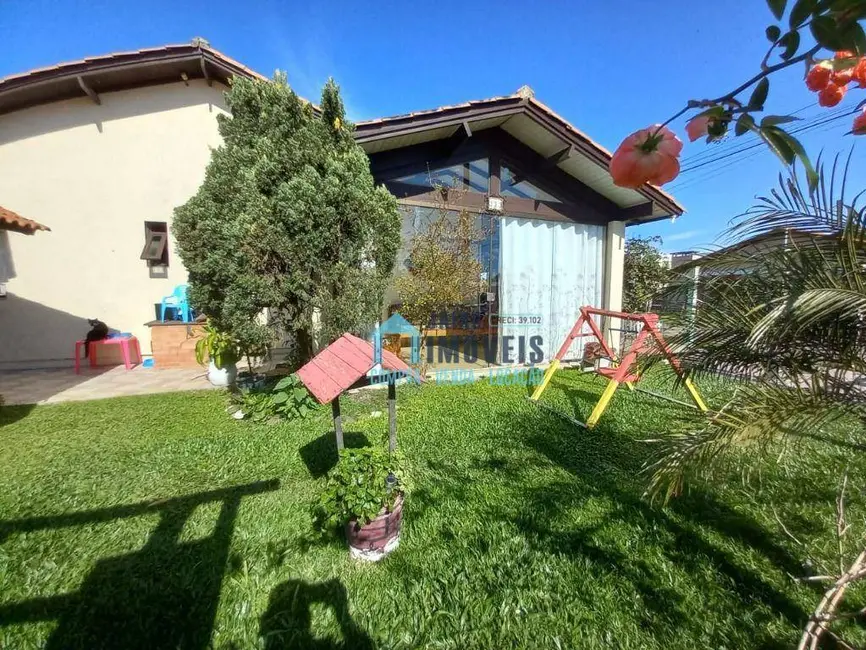 Casa com 3 quartos à venda em Tramandai - RS - imagem 5 Foto 5 de Casa com 3 quartos à venda em Tramandai - RS