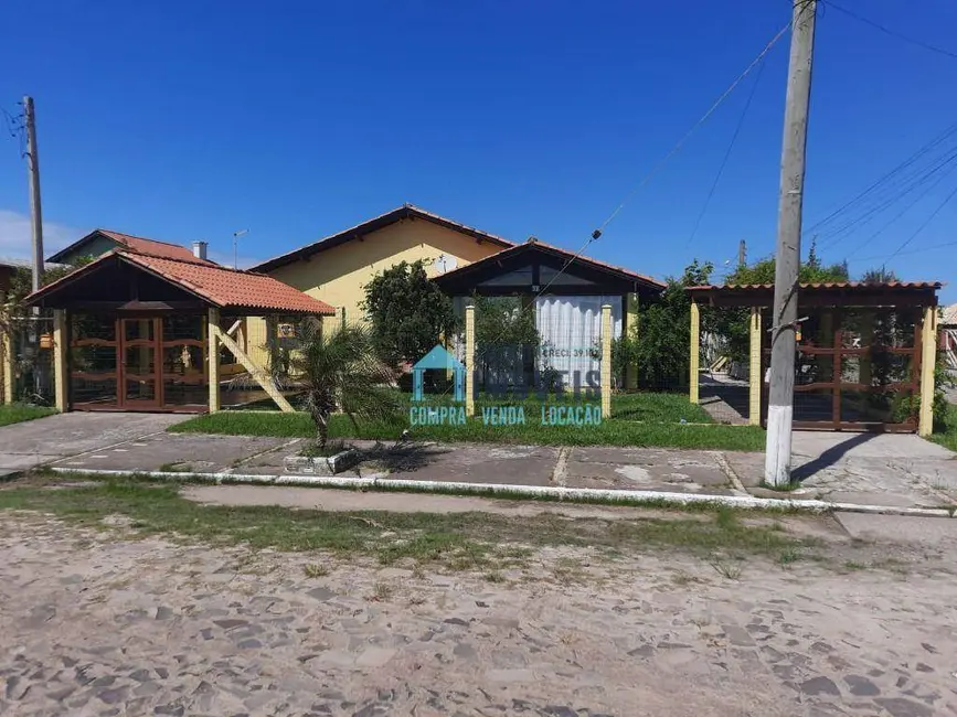 Casa com 3 quartos à venda em Tramandai - RS - imagem 1 Foto 1 de Casa com 3 quartos à venda em Tramandai - RS