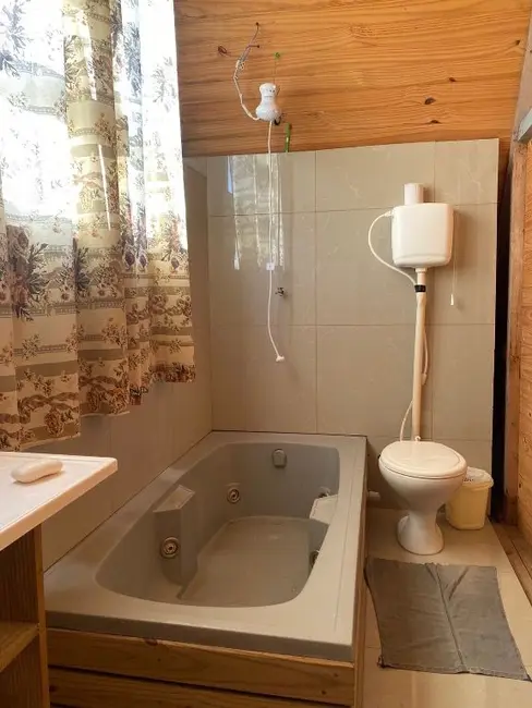 Casa com 2 quartos à venda, 450m2 em Tramandai - RS - imagem 4 Foto 4 de Casa com 2 quartos à venda, 450m2 em Tramandai - RS