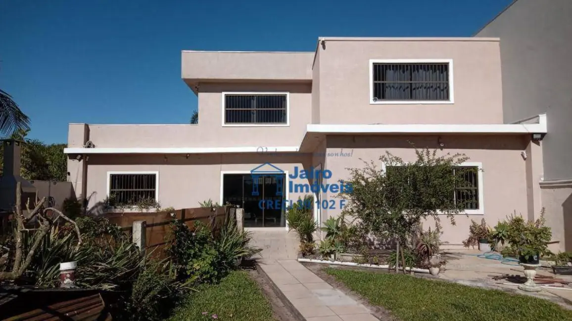 Casa com 3 quartos à venda em Tramandai - RS - imagem 1 Foto 1 de Casa com 3 quartos à venda em Tramandai - RS