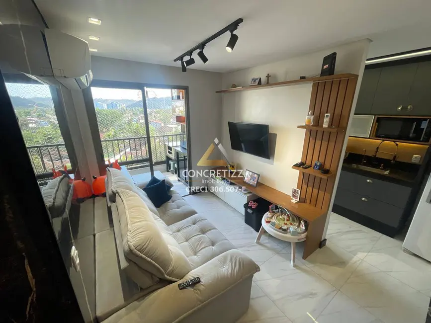 Foto 1 de Apartamento com 2 quartos à venda, 62m2 em Martim de Sá, Caraguatatuba - SP