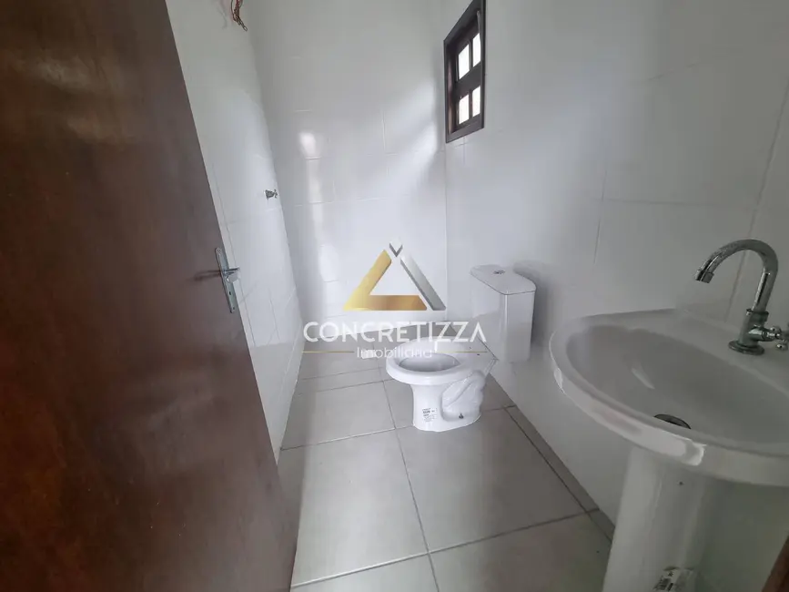 Foto 6 de Sobrado com 3 quartos à venda, 111m2 em Indaiá, Caraguatatuba - SP