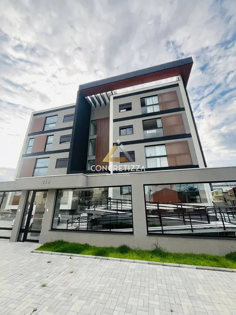 Foto 2 de Apartamento com 2 quartos à venda, 62m2 em Caraguatatuba - SP