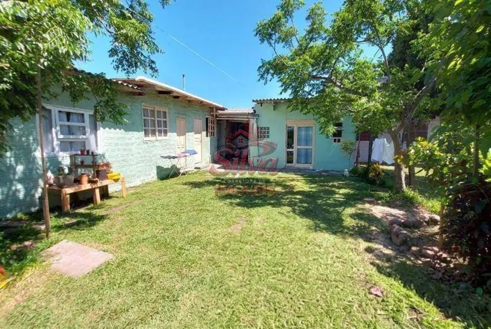 Foto 1 de Casa com 4 quartos à venda em Imbe - RS