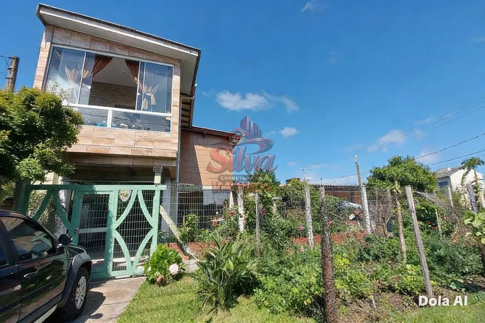 Foto 1 de Casa com 3 quartos à venda em Imbe - RS