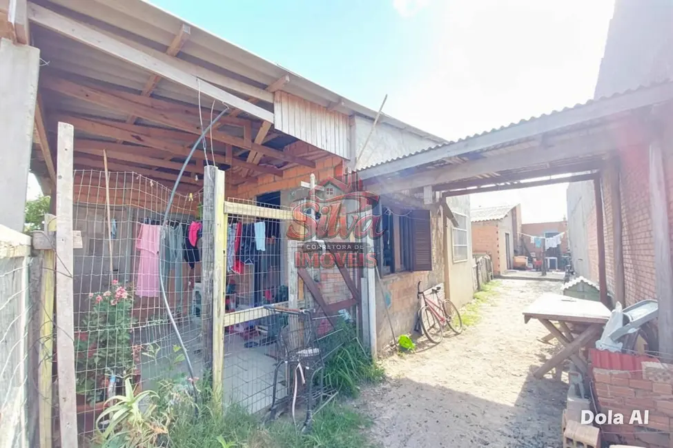 Foto 1 de Casa com 6 quartos à venda em Imbe - RS