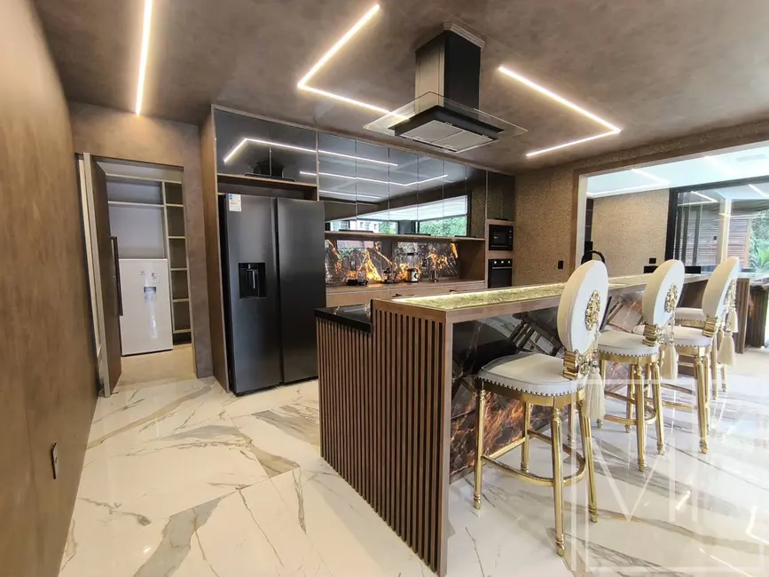 Foto 4 de Casa com 6 quartos à venda, 581m2 em Riviera de São Lourenço, Bertioga - SP