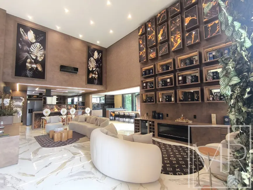 Foto 2 de Casa com 6 quartos à venda, 581m2 em Riviera de São Lourenço, Bertioga - SP